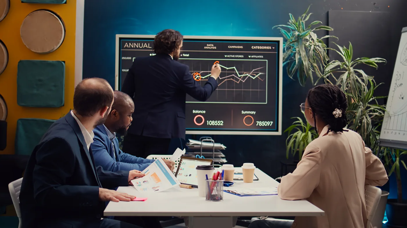 Vigorant healthcare marketing team reviewing custom dental landing page on multiple screens