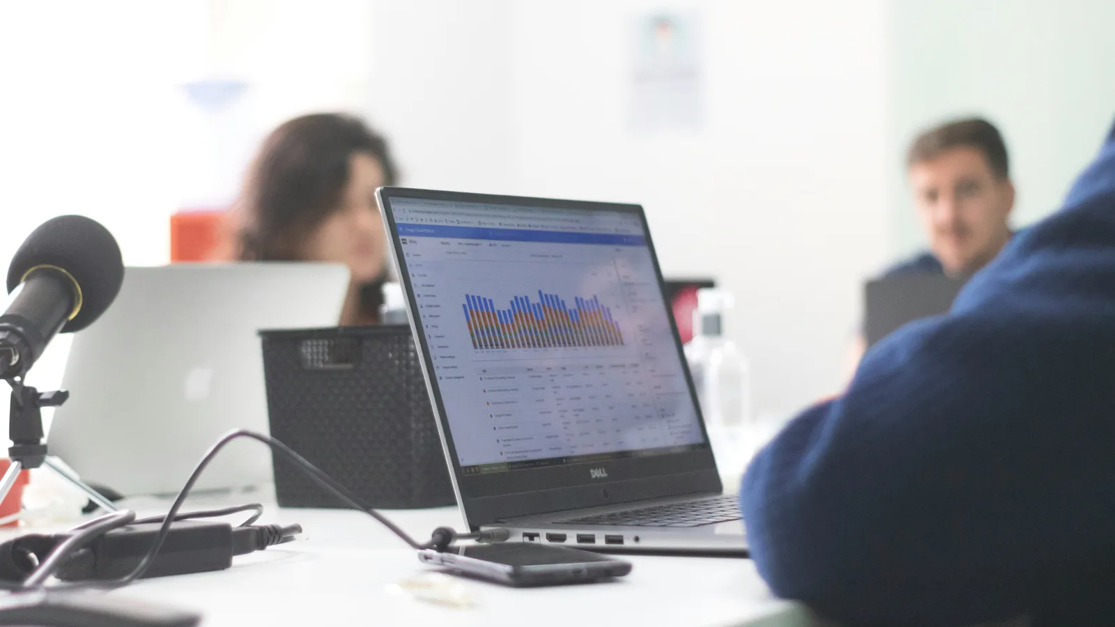 Healthcare practice owner reviewing SEO and paid advertising performance dashboards on a laptop