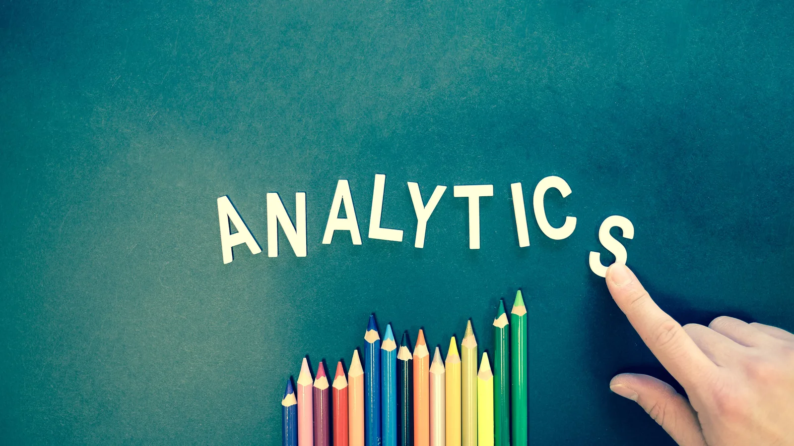 Healthcare practice owner reviewing marketing performance dashboards and analytics on a laptop