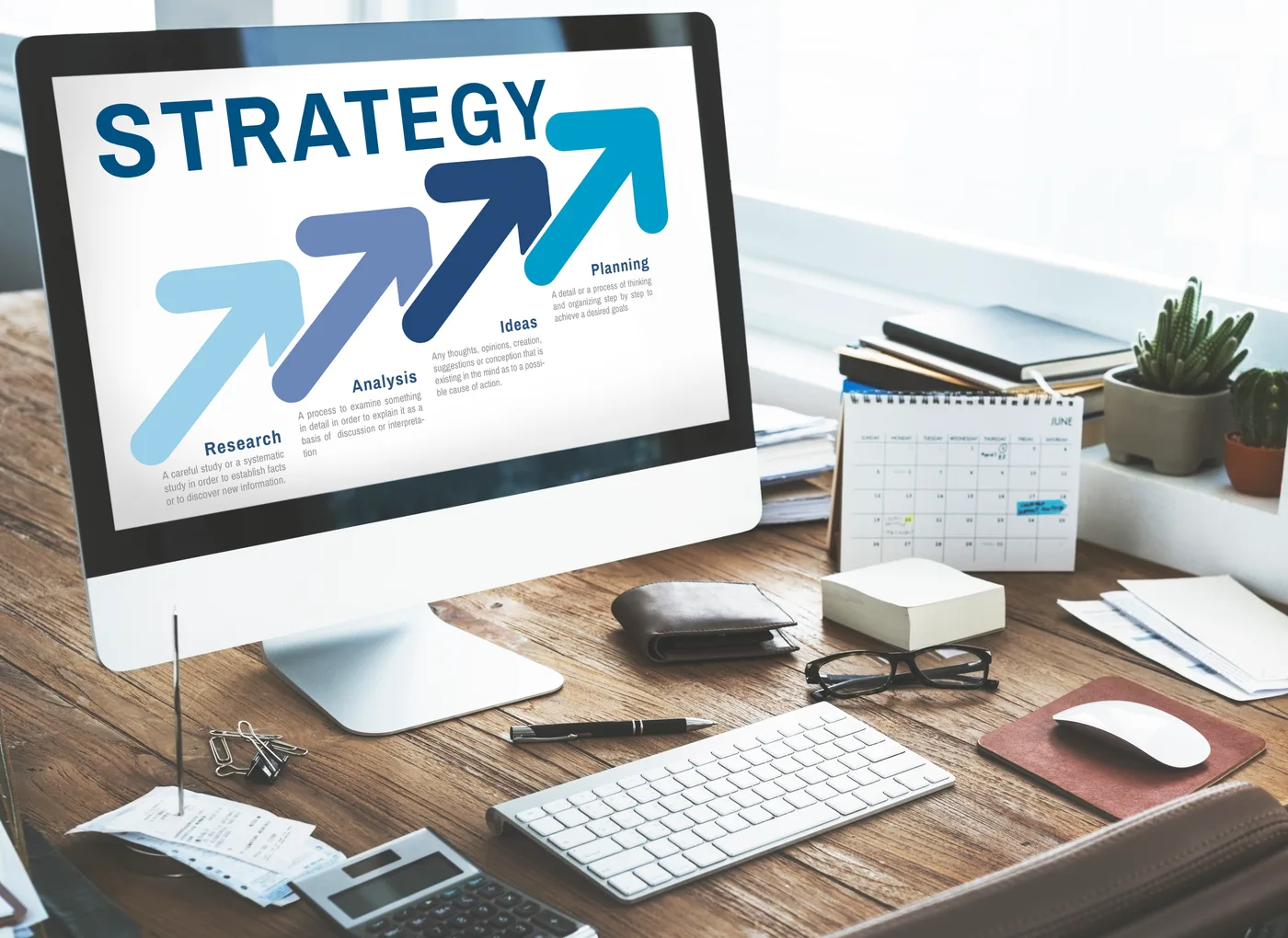 Dental content marketing strategy displayed on a laptop with keyword and topic planning