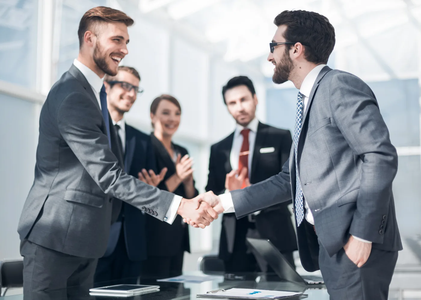 Brand manager and micro-influencer collaborating on a content partnership strategy