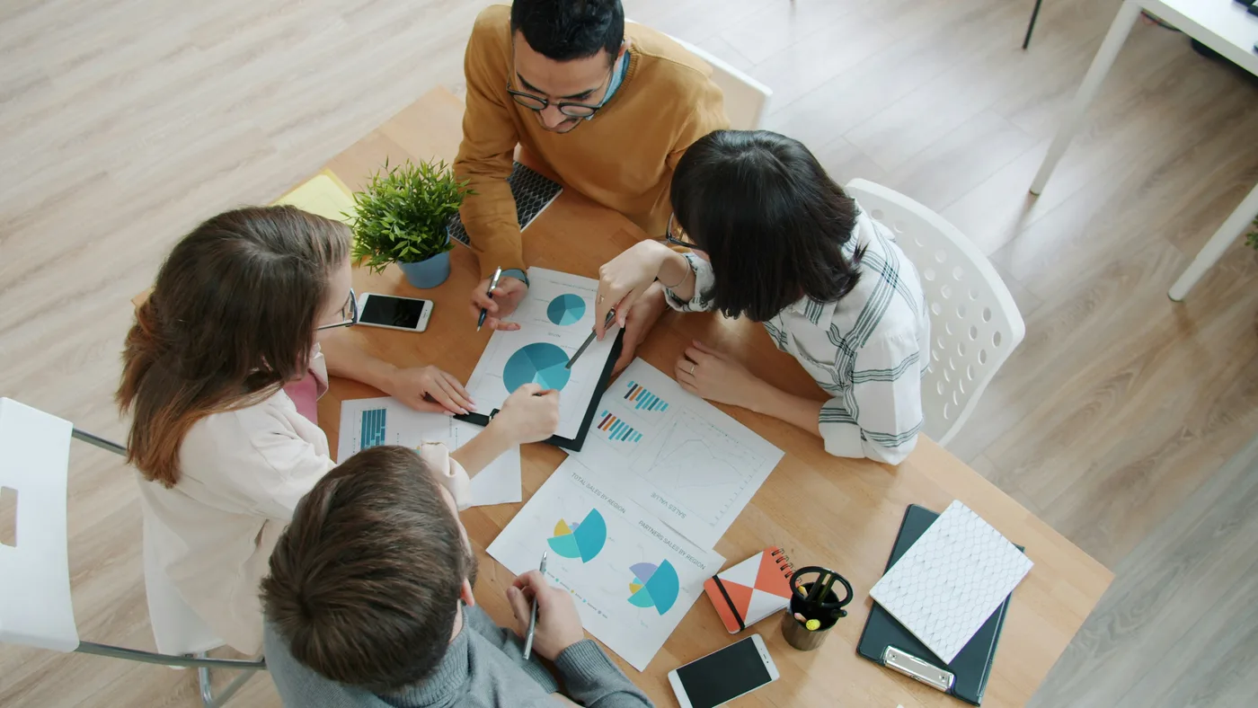 Healthcare professionals reviewing digital experience and website performance data