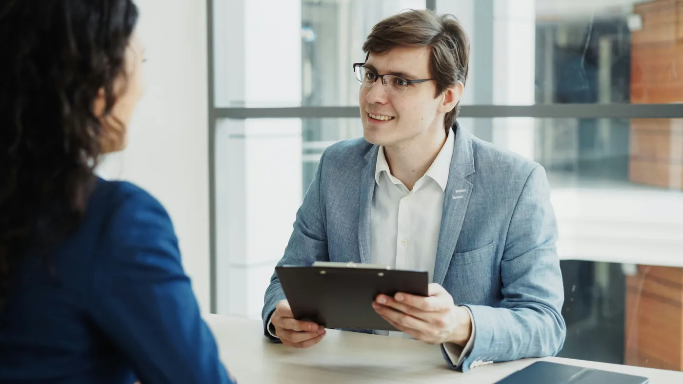 Healthcare professionals reviewing patient engagement and marketing performance data