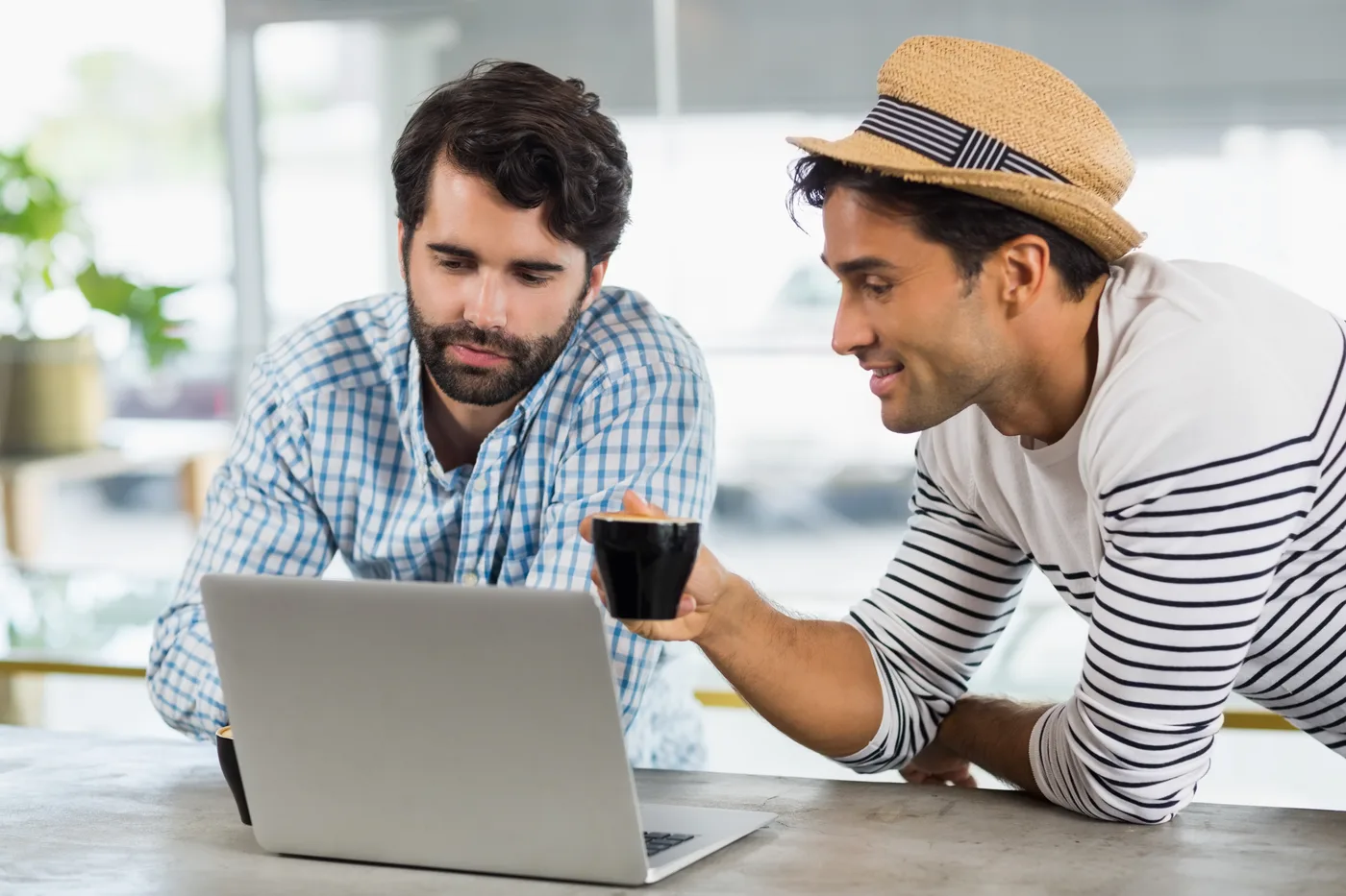 Startup website design mockup on laptop and mobile showing optimised landing page layout